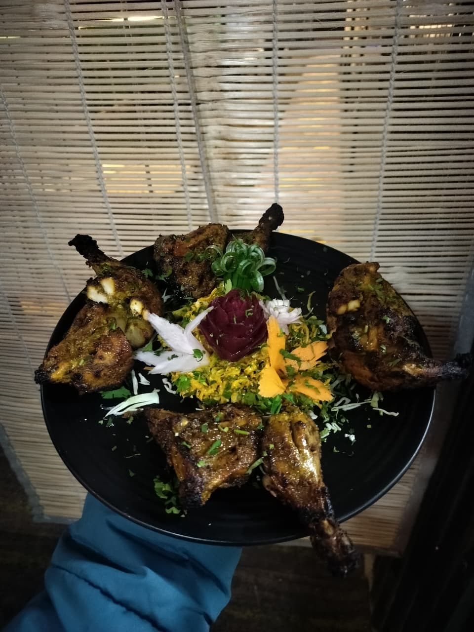 Tandoori platter with naan and kebabs at Swad ki Mehfil